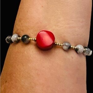 Red coral and black and white boulite bracelet, a gem created by the hand of man